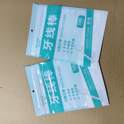 ถุงบรรจุขนมฟลอสพิกที่สามารถปิดใหม่ได้ ป้องกันหลายชั้น FDA อนุมัติขนาดที่กําหนดเองและการพิมพ์โลโก้สําหรับผลิตภัณฑ์ความสะอาดฟัน